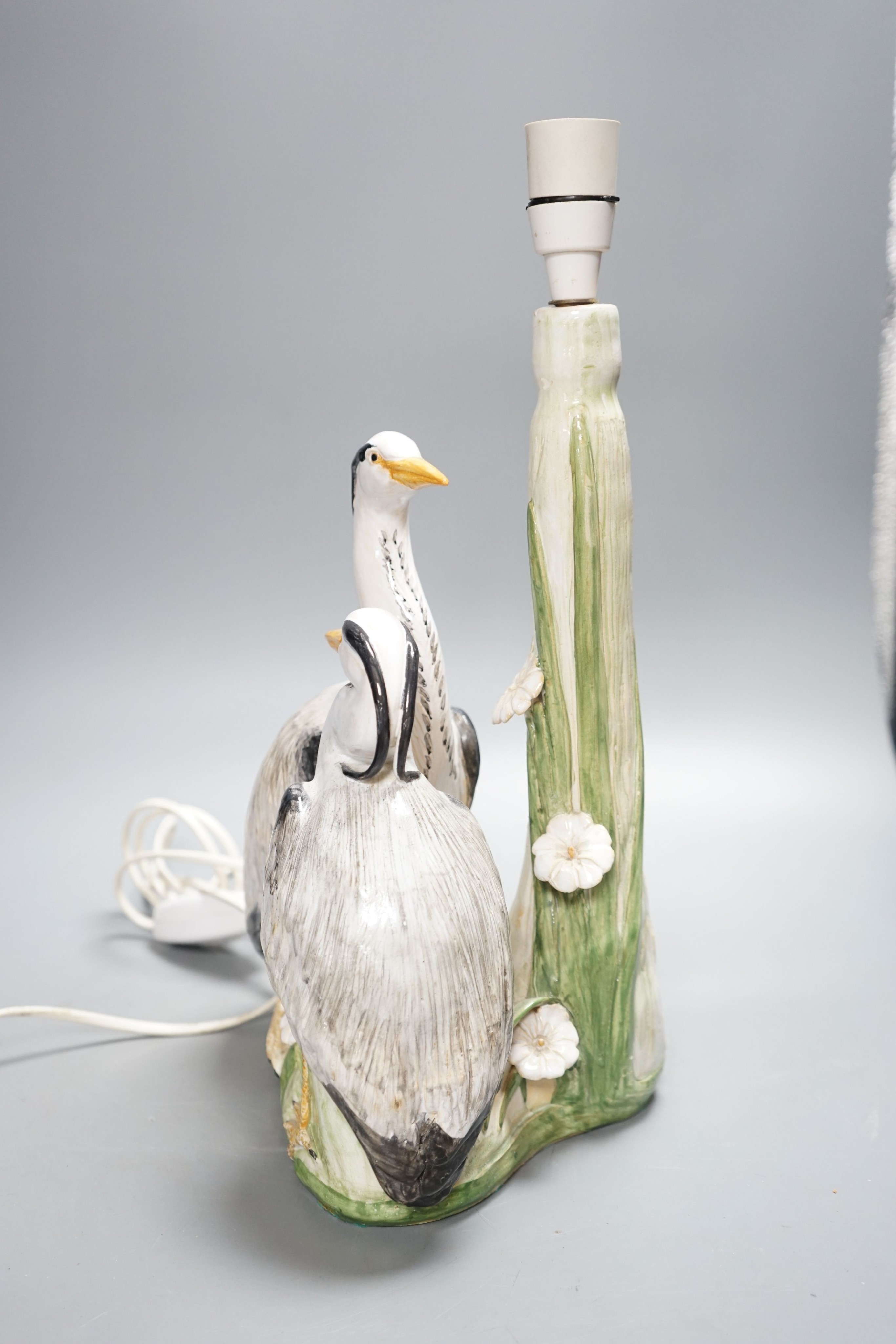 A tin glazed pottery twin heron table lamp, by Brenda Dennis 33cm